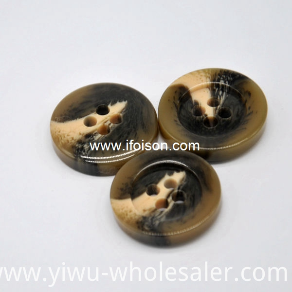 Imitation horn button